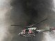 O helicóptero água da Polícia Militar teve que
ser acionado para conter o fogo