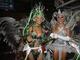 <b>MÔNICA CARVALHO - 2001/1996</b><br>A atriz Mônica Carvalho (à esquerda) brilhou à frente da bateria da Grande Rio em dois momentos. Em 2001, a morena estava no desfile que o carnavalesco Joãosinho Trinta colocou um astronauta para voar no enredo sobre o profeta Gentileza. Cinco anos antes, a musa fez a sua estreia na escola de Caxias