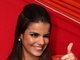 Esbanjando simpatia, a morena, que é casada, está <a href="http://http://entretenimento.r7.com/musica/noticias/babado-novo-mostra-sua-nova-claudia-leitte-veja-20120503.html">quase um ano nos vocais</a> do grupo