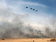 Aviões militares participam de exercício em Udaira, no Kuait, durante comemoração do 52º aniversário de independência e do 22º aniversário do fim da Guerra do Golfo