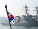 Dois destróieres capazes de interceptar mísseis, o USS Lassen (DDG 82) e o USS Fitzgerald (DDG62), são vistos em um porto naval sul-coreano em Donghae, cerca de 190 km a leste de Seul no dia 9 de março