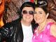 O deputado Anthony Garotinho (PR-RJ) e a prefeita de Campos dos Goytacazes, Rosinha Garotinho (PR-RJ), foram fantasiados a uma festa. Ele foi fantasiado de Elvis Presley e ela de 'anos 60'