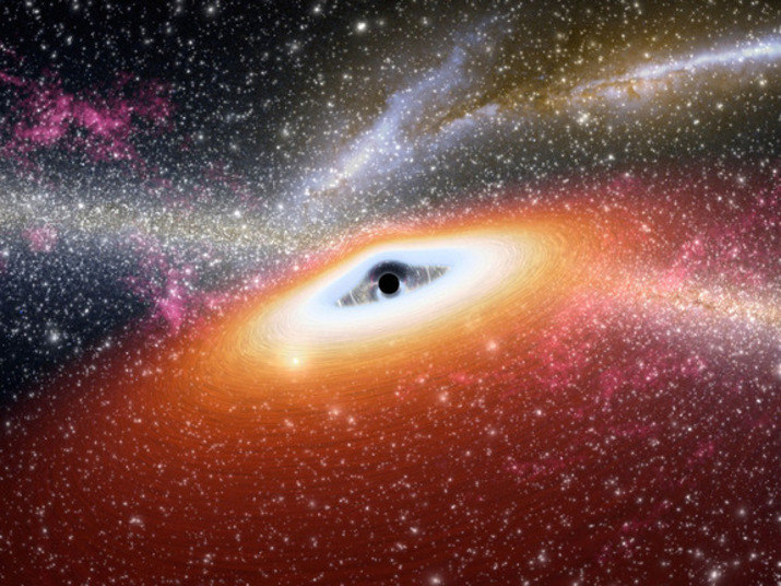 Buracos negros são regiões do espaço que possuem uma grande força concentrada. Isso faz com que nada possa escapar da atração deles, nem mesmo a luz — é desse motivo que surgiu o nome deles. Essa imagem mostra um buraco negro captado pelo telescópio Spitzer. Confira os maiores buracos negros do Universo!