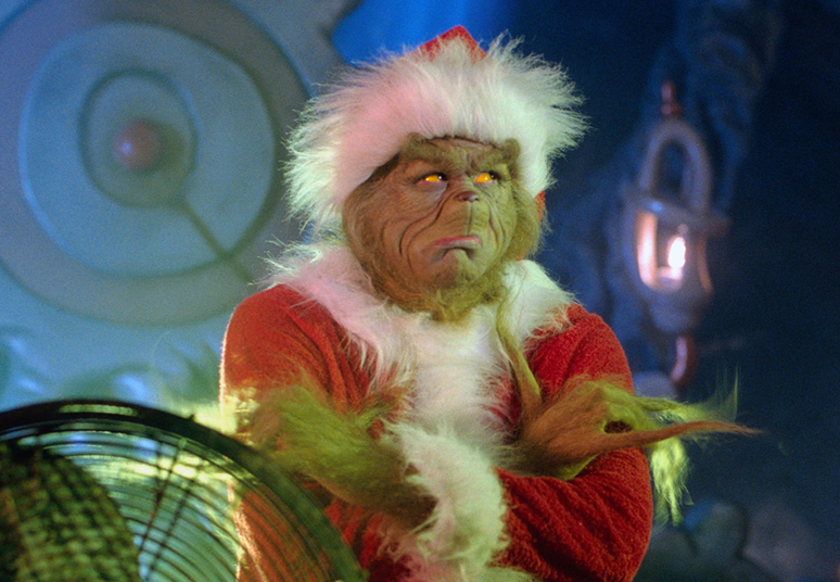 

Não parece, mas por baixo da
máscara da criatura que odeia o Natal de O Grinch (2001) está Jim Carrey

