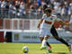 Serginho, destaque do Santos na Copinha, chuta para marcar o segundo gol do Peixe na decisão da Copinha contra o Corinthians. Leia mais