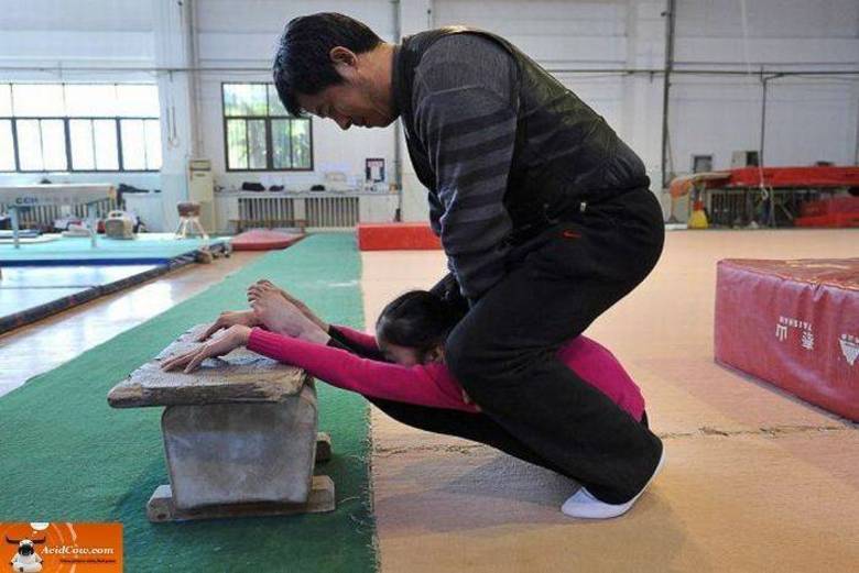 Treinador chinês gosta de atleta assim: que tá contigo e não abre! Treinador chinês gosta de atleta assim: que tá contigo e não abre!