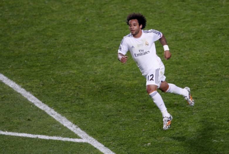Marcelo comemora seu gol na partida diante do Atlético de Madrid, o terceiro do Real