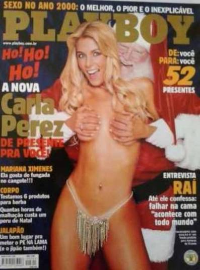 Há quem curta o fetiche do Papai Noel, mas é impossível negar que esta capa 'histórica' de Carla Perez, de 2000, deixa qualquer um um pouco perturbado. O bom velhinho está segurando os seios da loira do Tchan! 