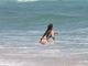 Ex-BBBs Nasser e Andressa curtem início de semana em praia carioca