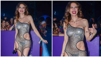 Com macacão recortado, Luciana Gimenez deixa lingerie à mostra no sambódromo da Sapucaí (Fotos de Brazil News)