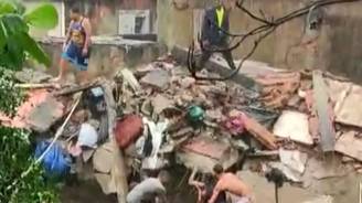 Morre homem resgatado após desabamento em Nilópolis; ele é a nona vítima do temporal (Record TV Rio)