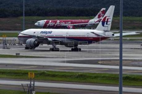 Aviões da Malaysia Airlines no Aeroporto Internacional de Kuala Lumpur Aviões da Malaysia Airlines no Aeroporto Internacional de Kuala Lumpur