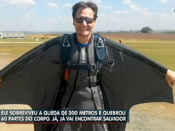 Um paraquedista está em queda livre a uma taxa de 200 km/h q