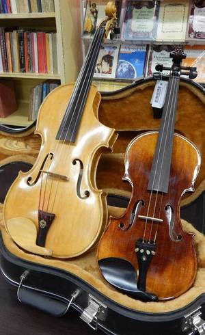 Instrumento é similar ao violino, mas com som mais grave. Instrumento é similar ao violino, mas com som mais grave.