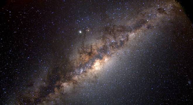 Essa é a Via Láctea, galáxia que abriga o nosso planeta em foto divulgada pela agência espacial norte-americana Essa é a Via Láctea, galáxia que abriga o nosso planeta em foto divulgada pela agência espacial norte-americana