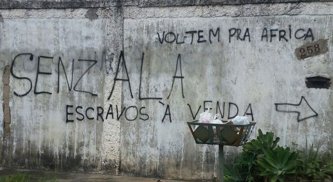 Nova pichação feita em muro da vítima sobre antiga, que foi pintada
