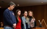 Madison Rae Margraves and her sister Lauren stand with their parents after giving their victim statements during the sentencing hearing for Larry Nassar, a former team USA Gymnastics doctor who pleaded guilty in November 2017 to sexual assault charges, in the Eaton County Court in Charlotte, Michigan, U.S., February 2, 2018. REUTERS/Rebecca Cook