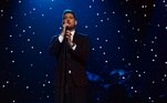 A emoção vai rolar solta! Nada como encerrar o ano com um show espetacular de um grande artista reconhecido no mundo todo: Michael Bublé.

Premiado com quatro Grammys e com milhões de discos vendidos internacionalmente, o cantor iniciou a carreira aos 16 anos e se inspirou desde cedo em um de seus ídolos, Frank Sinatra, construindo uma identidade própria que percorre por diferentes estilos musicais.

Para tornar este fim de ano mais especial, uma apresentação de Bublé vai levar o público brasileiro a uma jornada musical por sua carreira.

Serão apresentados alguns hits de sucesso e canções de seu último álbum, “Love”, considerado um dos mais românticos de sua discografia e composto por reinterpretações de grandes clássicos dos anos 50 e 60.

O artista ainda compartilha histórias de sua trajetória e fala sobre quem o inspirou nessa caminhada, abrindo espaço para muita comoção e oportunidades para alcançar os corações dos telespectadores.

Compareça a esse emocionante espetáculo para sua marca brilhar no fim de ano ao som de muita música e emoção!