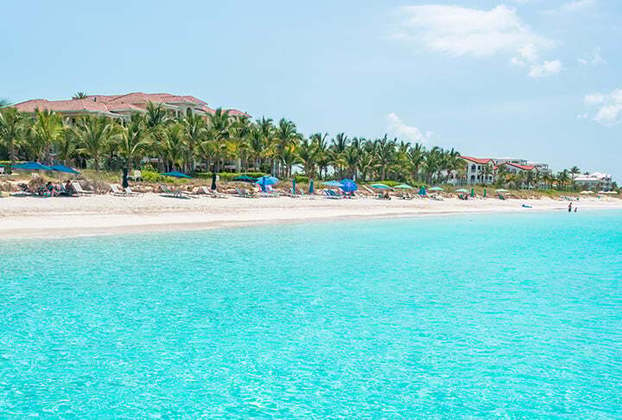 5 - Grace Bay – Caribe - Fica nas Ilhas Turcas e Caicos, que pertencem ao Reino Unido. 