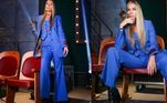 Blazer, colete e calça de alfaiataria. Falando assim parece um look sem muita graça, certo? Não para Adriane Galisteu. A apresentadora vestiu a combinação das três peças em um tom de azul acompanhadas por uma bota de salto alto e, mais uma vez, provou que o básico também pode ser chique e cheio de personalidade!