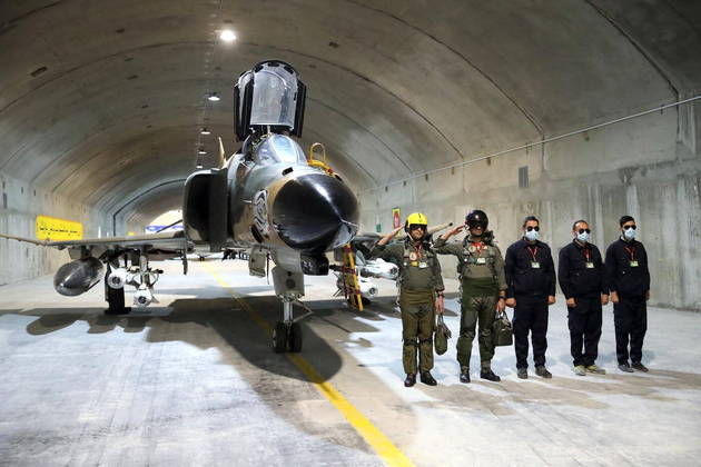 A handout picture provided by the Iranian Army office on February 7, 2023 shows a fighter jet during the unveiling of Iran's first underground military air base in an undisclosed location.

