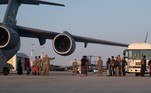 GERMANY-AFGHANISTAN-EVACUATION-CONFLICT
In this image courtesy of the US Air Force, a group of Afghan evacuees depart a C-17 Globemaster III aircraft at Ramstein Air Base, Germany, on August 20, 2021.
Taylor Slater / US AIR FORCE / AFP