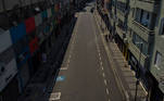 Picture of an empty street in Sao Paulo, Brazil, taken on March 15, 2021 hours before a night-time curfew takes effect in the state of Sao Paulo amid the novel coronavirus COVID-19 pandemic. The state of Sao Paulo has been in a 'red' alert since March 6 due to a coronavirus uptick, with the closure of parks, bars, restaurants, museums and non-essential shops. Sao Paulo is the hardest-hit state, with nearly 64,000 deaths, and will impose even stricter curbs Monday, with churches closed, sports events cancelled, and a nightly curfew.

Miguel SCHINCARIOL / AFP