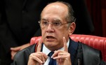(FILES) In this file photo taken on June 09, 2017, Supreme Electoral Court (TSE) President Gilmar Mendes speaks during the session examining whether the 2014 reelection of president Dilma Rousseff and her then vice president Michel Temer should be invalidated because of corrupt campaign funding, in Brasilia. Changing and poorly explained quarantines, contradictory judgements, erroneous vaccination forecasts: in Brazil, the global epicentre of the pandemic, the fight against the coronavirus is being conducted in the greatest confusion. EVARISTO SA / AFP