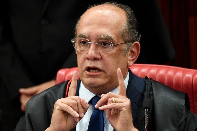 (FILES) In this file photo taken on June 09, 2017, Supreme Electoral Court (TSE) President Gilmar Mendes speaks during the session examining whether the 2014 reelection of president Dilma Rousseff and her then vice president Michel Temer should be invalidated because of corrupt campaign funding, in Brasilia. Changing and poorly explained quarantines, contradictory judgements, erroneous vaccination forecasts: in Brazil, the global epicentre of the pandemic, the fight against the coronavirus is being conducted in the greatest confusion.
EVARISTO SA / AFP