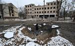The view of military facility which was destroyed by recent shelling in the city of Brovary outside Kyiv on March 1, 2022.
Russian troops will carry out an attack on the infrastructure of Ukraine's security services in Kyiv and urged residents living nearby to leave, the defence ministry said on March 1, 2022.
Genya SAVILOV / AFP


