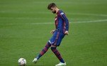 Barcelona's Spanish defender Gerard Pique kicks the ball during the Spanish league football match between Sevilla FC and FC Barcelona at the Ramon Sanchez Pizjuan stadium in Seville on February 27, 2021.
CRISTINA QUICLER / AFP