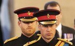 Britain's Prince Harry (L), Duke of Sussex, and Britain's Prince William (R), Prince of Wales arrive to mount a vigil around the coffin of Queen Elizabeth II, draped in the Royal Standard with the Imperial State Crown and the Sovereign's orb and sceptre, lying in state on the catafalque in Westminster Hall, at the Palace of Westminster in London on September 16, 2022, ahead of her funeral on Monday. Queen Elizabeth II will lie in state in Westminster Hall inside the Palace of Westminster, until 0530 GMT on September 19, a few hours before her funeral, with huge queues expected to file past her coffin to pay their respects.
Ian Vogler / POOL / AFP
