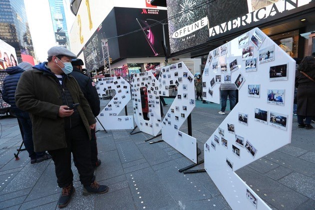 NEW YORK, NEW YORK - DECEMBER 20: A photo wall of polaroids taken by visitors at the arrival of the 2022 New Year's Eve Numerals in Times Square on December 20, 2021 in New York City. Rob Kim/Getty Images/AFP
ROB KIM / GETTY IMAGES NORTH AMERICA / Getty Images via AFP