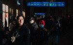 A woman carries her cat while waiting to board an evacuation train at Kyiv central train station on February 28, 2022. The Russian army said on February 28 that Ukrainian civilians could 'freely' leave the country's capital Kyiv and claimed its airforce dominated Ukraine's skies as its invasion entered a fifth day.

Dimitar DILKOFF / AFP