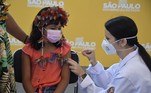 An indigenous girl receives the first dose of the Pfizer-BioNTech vaccine against COVID-19, at the Clinicas hospital in Sao Paulo, Brazil, on January 14, 2022.
NELSON ALMEIDA / AFP