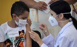 A boy receives the first dose of the Pfizer-BioNTech vaccine against COVID-19, at the Clinicas hospital in Sao Paulo, Brazil, on January 14, 2022.
NELSON ALMEIDA / AFP