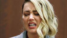 Amber Heard chora em tribunal ao ler mensagens de Depp desejando que ela morresse