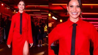 Andressa Suita aposta em visual vermelhão com fenda e gravata preta (Manuela Scarpa/ Brazil News)