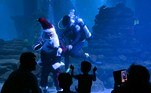 INDIA-LIFESTYLE-CHRISTMAS
A scuba diver dressed as Santa Claus performs at the Marine Aquarium on the eve of Christmas celebrations in Chennai on December 24, 2023.
R. Satish BABU / AFP