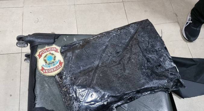 Colombiano viajava com 6,5 kg de cocaína escondidos em fundo falso na mala