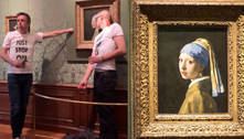 Ativista cola a cabeça na pintura 'Moça com Brinco de Pérola' na Holanda