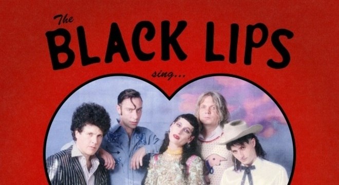 black lips sing in a world that