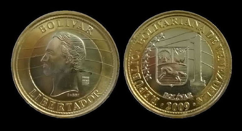 O frente e verso de um bolívar, a moeda venezuelana