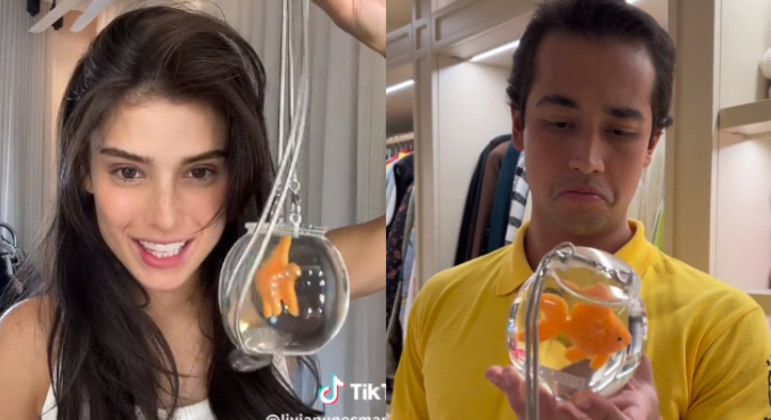 Influenciadora diverte a web com reação do namorado ao ver a bolsa de aquário dela
