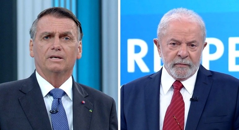 Jair Bolsonaro (PL) e Luiz Inácio Lula da Silva (PT) durante debate nesta sexta-feira (28)