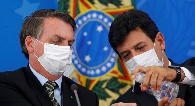 O presidente Jair Bolsonaro e o ex-ministro Luiz Henrique Mandetta