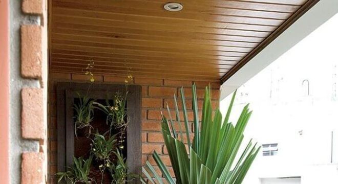cadeira de madeira para varanda pequena