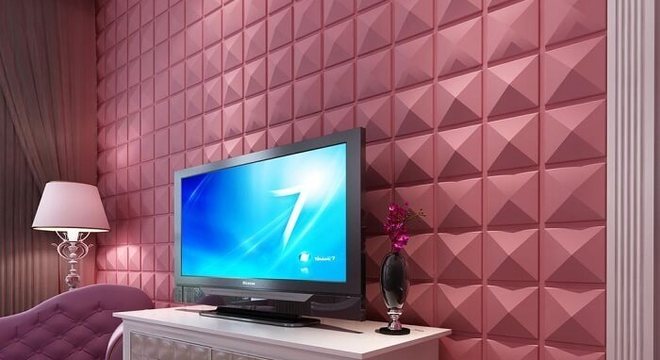 Cantinho especial com parede revestida com placa de gesso 3D em tom pink