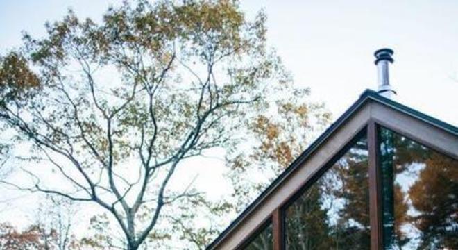 casas de madeira - casa de madeira com portas de vidro 