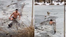 Cidadão seminu mergulha em rio congelado para salvar cão ilhado